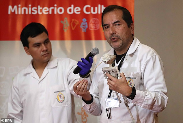 Flavio Estrada (right), forensic archaeologist of the Institute of Legal Medicine and Forensic Sciences of Lima of the Public Ministry has said the alien bodies are 'doll' made of animal parts