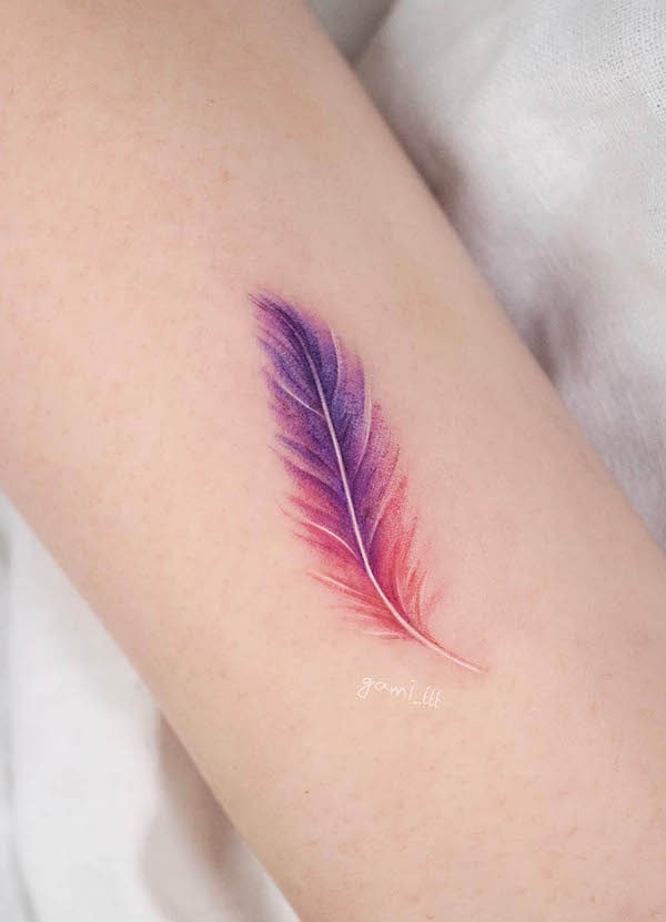 Super detailed purple and pink feather tattoo by @gami_ttt