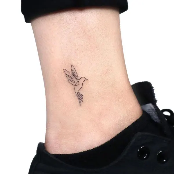 Simple small bird tattoo by @gigi_tattooer