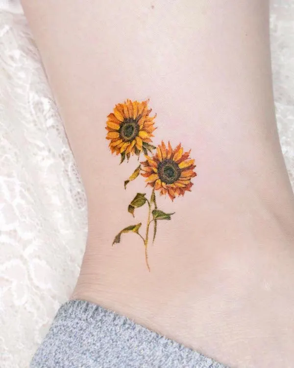 Sunflower ankle tattoo by @tilda_tattoo