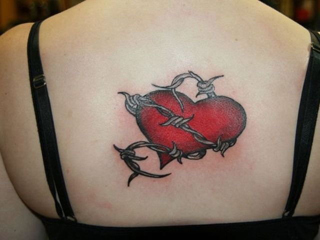 Barbed wire around heart tattoo