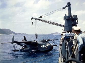 A Martin PBM Mariner suspended from a ship's stern crane. (Credit: PhotoQuest/Getty Images)