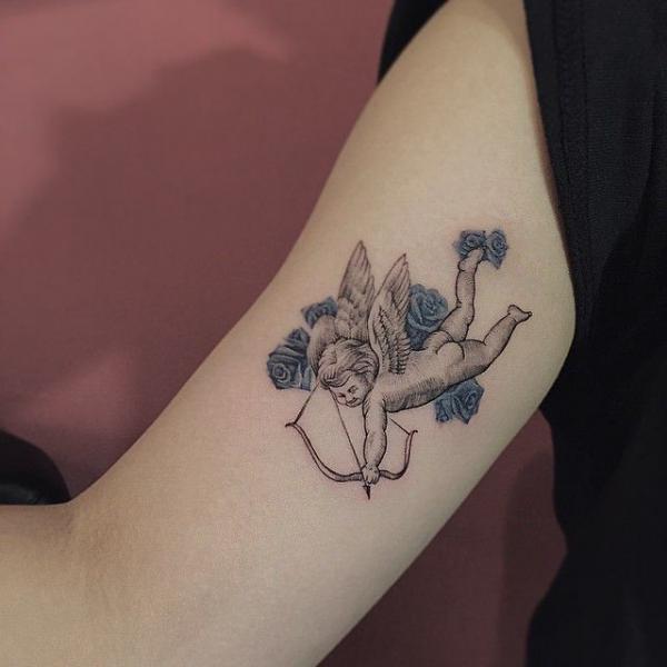 cupid and rose tattoo