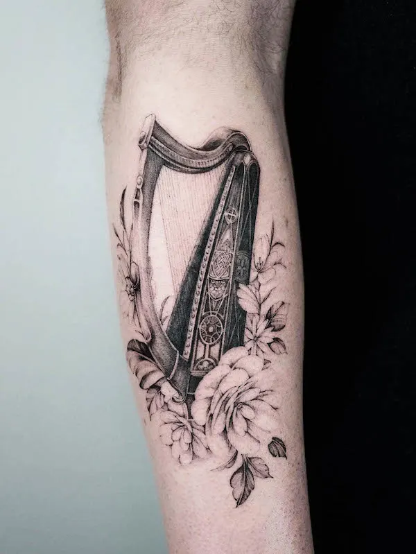 Harp tattoo by @jankyjake_tattoos