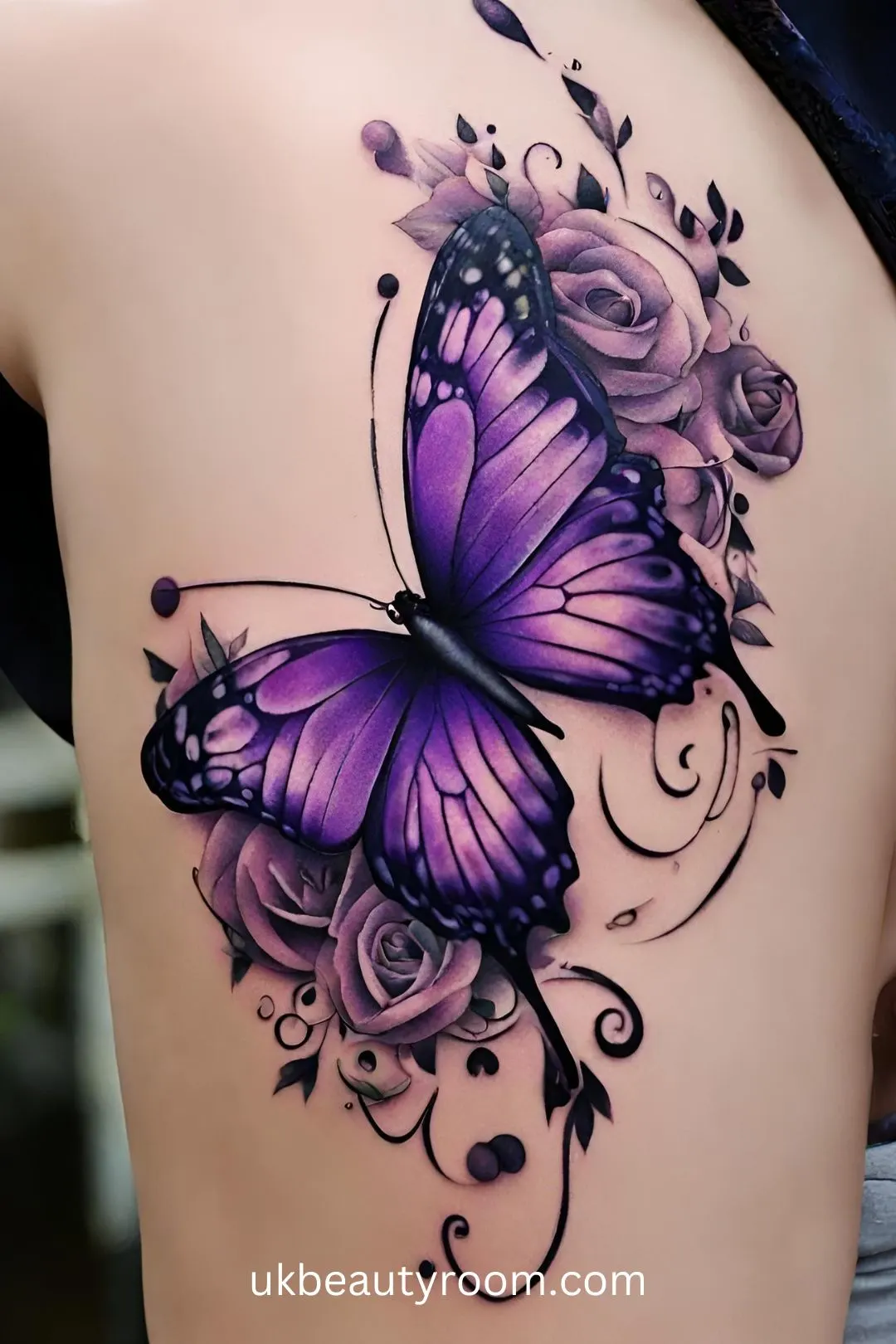 Purple butterfly tattoo