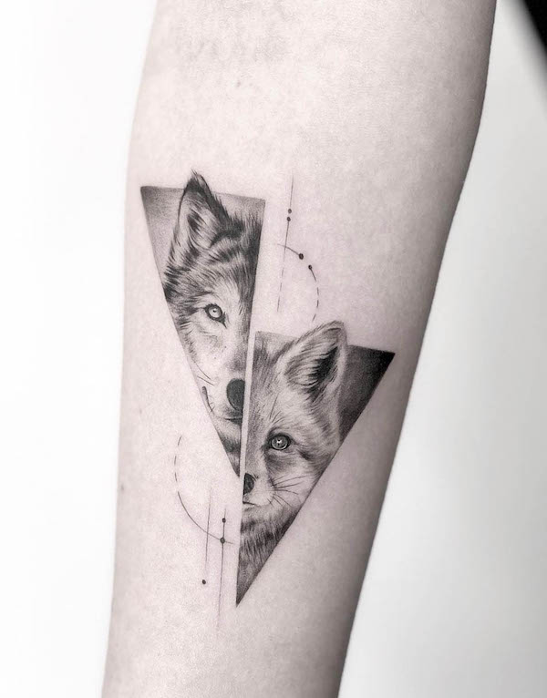 Wolf and fox tattoo by @eternitytattooberlin