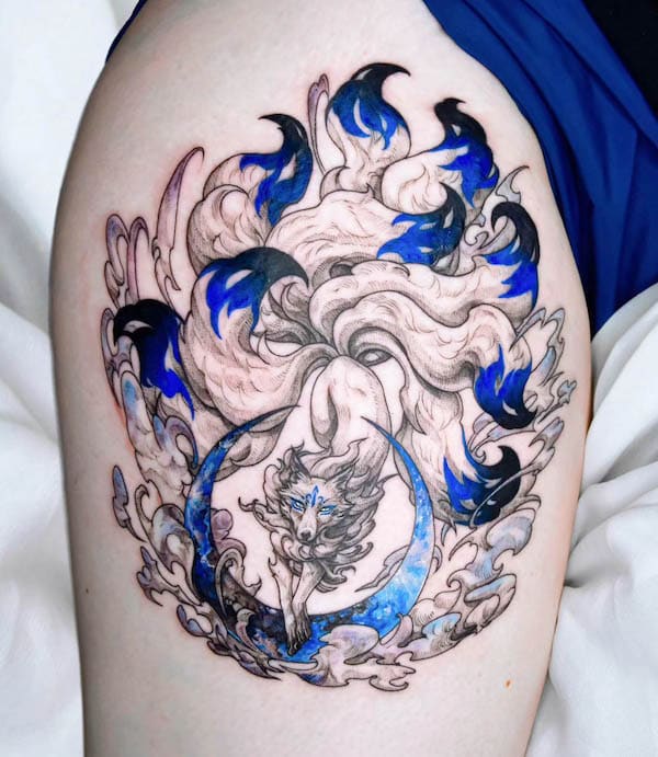 Stunning nine-tailed fox thigh tattoo by @nolgida.tattoo